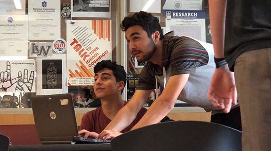 College students studying in a classroom